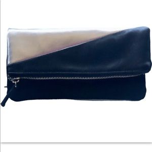 Silver and black fold over small bag